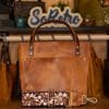 SoRetro Mini+ FYG Leather Crossbody Tote – Sandstorm with Exclusivo Mari Vines Navy on Cinnamon Cotton Webbing – Bronze Hardware