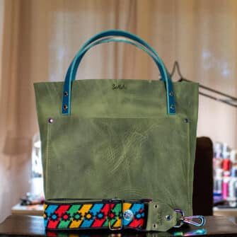 SoRetro Perfect FYG Leather Crossbody Tote – Trentino Muschio with Limited Sliding Daisies Rainbow on Olive Cotton Webbing – Chromalusion Hardware