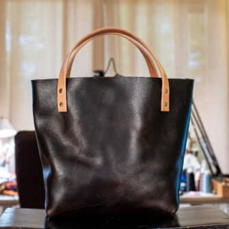 Alternative view of SoRetro Britannia Perfect FYG Leather Crossbody Tote – Becontree with Exclusivo Rustleleaf Black on Dune Cotton Webbing – Shiny Gold Hardware