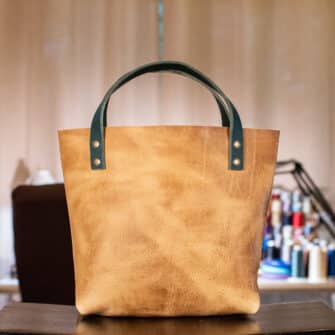 Alternative view of SoRetro Especial Reservo Mini+ FYG Leather Crossbody Tote – Yukon Gold with Limited Desert Waves on Dark Teal Cotton Webbing – Bronze Hardware