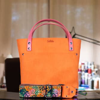 SoRetro Verdura Mini+ FYG Leather Crossbody Tote – La Tela Arancione with Limited Garden Along the Lake of Fire on Dusty Rose Cotton Webbing – Chromalusion Hardware