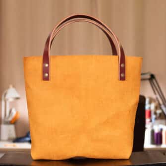 Alternative view of SoRetro Verdura Perfect FYG Leather Crossbody Tote – La Tela Turmeric with Exclusivo Sweet Camellia Blush on Mauve Cotton Webbing – Bronze Hardware