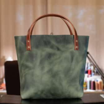 Alternative view of SoRetro Perfect FYG Leather Crossbody Tote – Northern Lights Limited My Favorite Retro Sweater on Dark Olive Cotton Webbing – Bronze Hardware