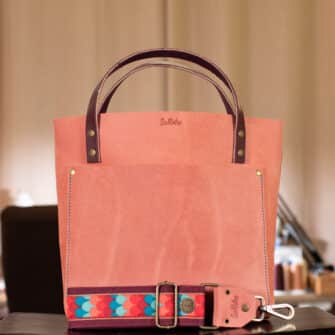 SoRetro Especial Reservo Perfect FYG Leather Crossbody Tote – Fuzzy Pink Eraser with Limited Clamshell Backsplash Summer Daze on Dark Cherry Cotton Webbing – Bronze Hardware