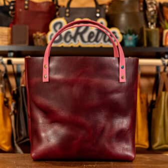 Alternative view of SoRetro Especial Perfect FYG Leather Crossbody Tote – Grammy's Cough Medicine with Exclusivo Tahitian Retrograde Dark on Wide Nubby Pinkbow Webbing – Chromalusion Hardware