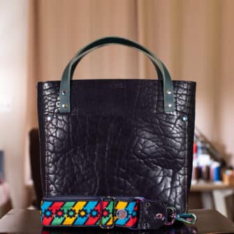 SoRetro Perfect FYG Leather Crossbody Tote – Thicc Boi Super Chunk Midnight with Limited Sliding Daisies Rainbow on Dark Plum Cotton Webbing – Chromalusion Hardware