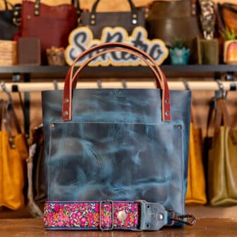 SoRetro Especial Reservo Perfect FYG Leather Crossbody Tote – Huron's Revenge with Flores y Frambuesas on Super Special Striped SoRetro Webbing – Gunmetal Hardware