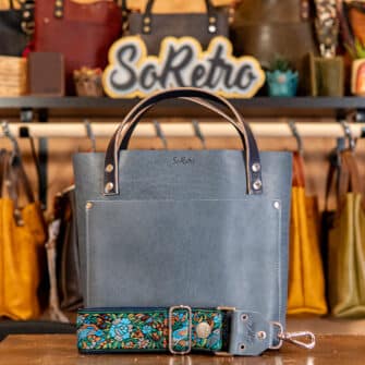 SoRetro Especial Reservo Mini+ FYG Leather Crossbody Tote – Sky Blue Guac with Limited Two Birds in the Hand on Super Special Striped SoRetro Webbing – Silver Hardware