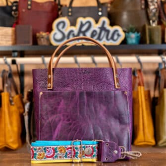 SoRetro Mini+ FYG Leather Crossbody Tote – Crushed Berries with Limited Positano Petals on Super Special Striped SoRetro Webbing – Silver Hardware
