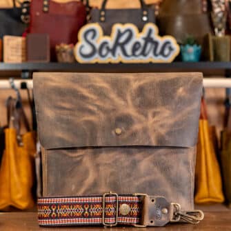 SoRetro Perfect Traveler FYG Leather Crossbody Tote – Outlaw with McKinley on SortaWide Serape Stripes Surprise Webbing – Bronze Hardware