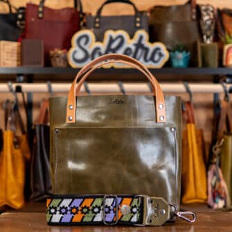 SoRetro Mini+ FYG Leather Crossbody Tote – Roasted Asparagus with Limited Sliding Daisies Lavender Garden on Dusty Rose Cotton Webbing – Gunmetal Hardware