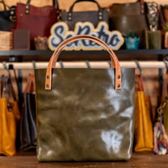 Alternative view of SoRetro Mini+ FYG Leather Crossbody Tote – Roasted Asparagus with Limited Sliding Daisies Lavender Garden on Dusty Rose Cotton Webbing – Gunmetal Hardware