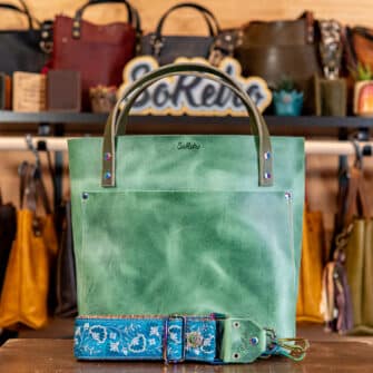 SoRetro Verdura Perfect FYG Leather Crossbody Tote – Scorza Di Anguria with Exclusivo Baby's Breath Ocean on Wide Nubby Rainbow for Webbing – Chromalusion Hardware