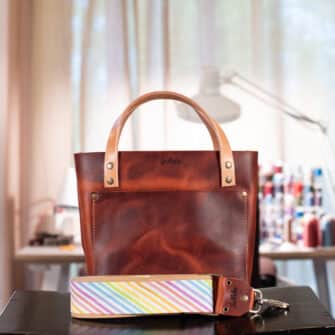 SoRetro Verdura Mini FYG Leather Crossbody Tote - Amaretto with Today's Rainbow on Dune Cotton Webbing - Bronze Hardware