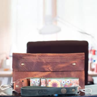 SoRetro Especial Reservo Stitch Sitch FYG Crossbody Clutch - Aged Oak Barrel No. 7 with Exclusivo Dahlia Sunshine on Olive Cotton Webbing - Bronze Hardware
