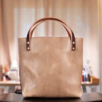 Alternative view of SoRetro Verdura Mini+ FYG Leather Crossbody Tote – Mare Sabbiosa with Heritage Ontonagon Sunset on Cinnamon Cotton Webbing – Bronze Hardware