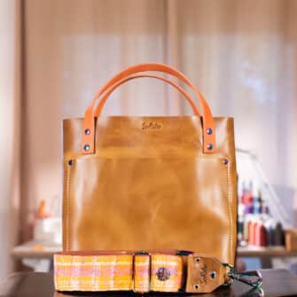 SoRetro Especial Reservo Mini+ FYG Leather Crossbody Tote – Golden Oak with Heritage Betsie River Sunshine on Sienna Cotton Webbing – Chromalusion Hardware