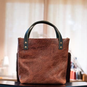 Alternative view of SoRetro Especial Reservo Mini FYG Leather Crossbody Tote - The Great Sequoia Tatanka with Limited Pike Bay Paisley Teal on Mocha Cotton Webbing - Bronze Hardware - Perfectly Imperfect