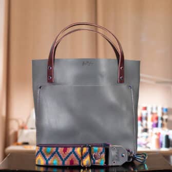 SoRetro Perfect FYG Leather Crossbody Tote – Graybergine with Limited Gateway River's Edge on Eggplant Cotton Webbing – Chromalusion Hardware