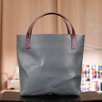 Alternative view of SoRetro Perfect FYG Leather Crossbody Tote – Graybergine with Limited Gateway River's Edge on Eggplant Cotton Webbing – Chromalusion Hardware