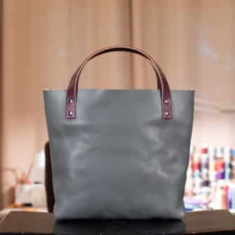 Alternative view of SoRetro Mini+ FYG Leather Crossbody Tote – Graybergine with Limited Gateway River's Edge on Eggplant Cotton Webbing – Chromalusion Hardware