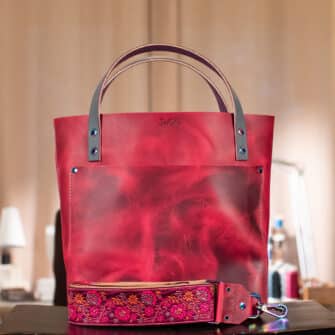 SoRetro Verdura Perfect FYG Leather Crossbody Tote – Tramonto Diablo with Limited McGregor Gardens Fuchsia on Simply SoRetro Sandstone Webbing – Chromalusion Hardware