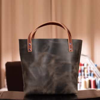 Alternative view of SoRetro Mini+ FYG Leather Crossbody Tote – Above Average Sage Energy with Heritage Delilah Gardens on Sienna Cotton Webbing – Chromalusion Hardware